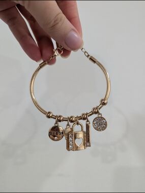 GUESS Gold-Tone Charm Bracelet with Lock & Crystal Accents